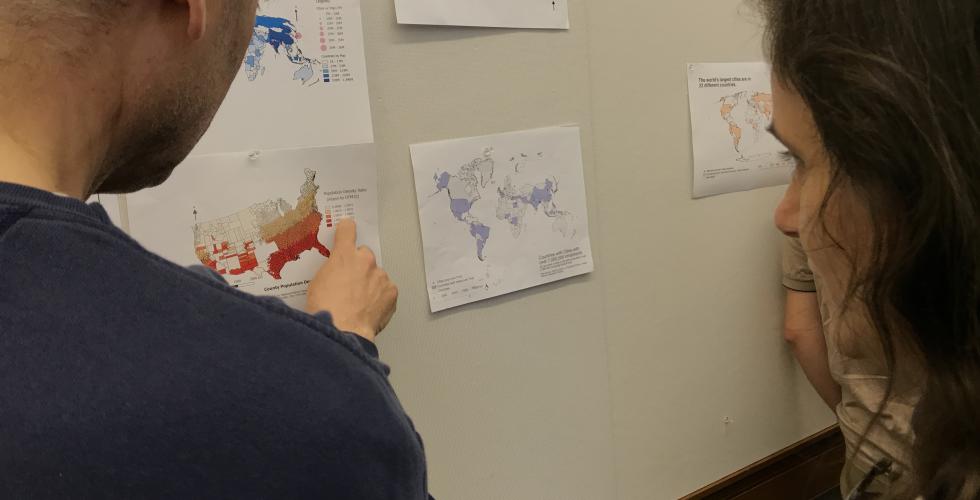 Participants discussing their first mapping assignments during the Summer 2017 Mapping for the Urban Humanities course.